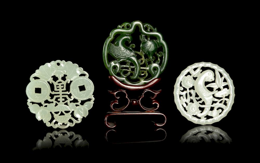 Appraisal: Three Chinese Reticulated Jade Pendants Largest diam cm Three Chinese