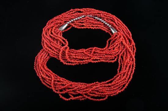 Appraisal: TWELVE-STRAND CORAL BEAD NECKLACE - L in