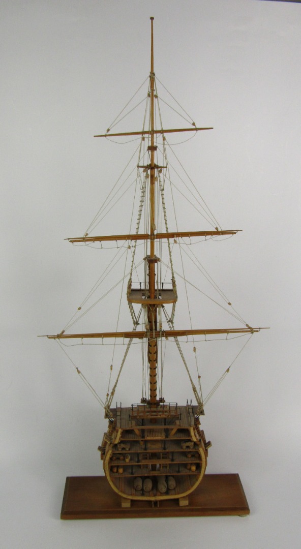 Appraisal: A wooden scale model cross section of a Man-O-War with