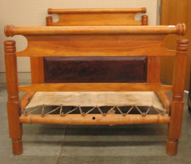 Appraisal: An antique hard rock maple rope bed circa early th