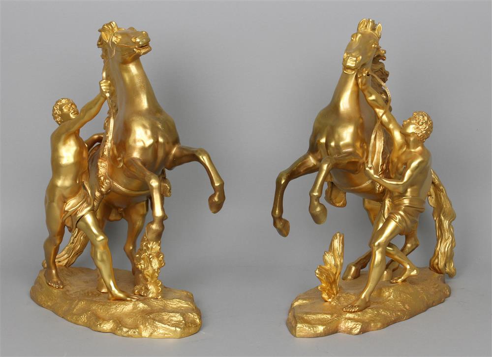 Appraisal: PAIR OF GILT BRONZE GROUPS OF THE HORSE-TAMERS OF MARLY