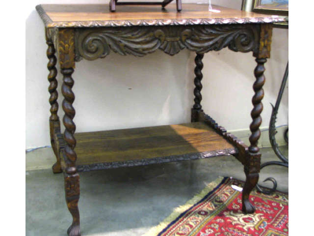 Appraisal: Arts and Crafts oak carved library table with barley twist