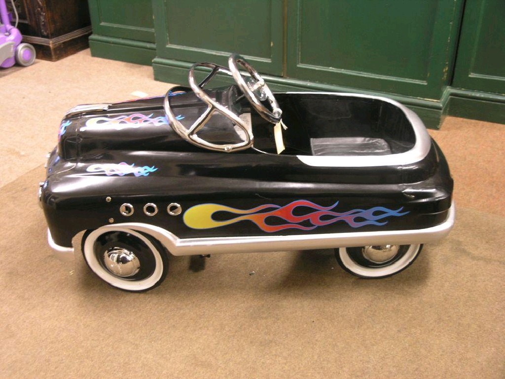 Appraisal: A child's toy pedal car based on an Austin aluminium