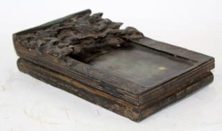 Appraisal: Chinese inkstone with dragon Chinese inkstone with dragon h x