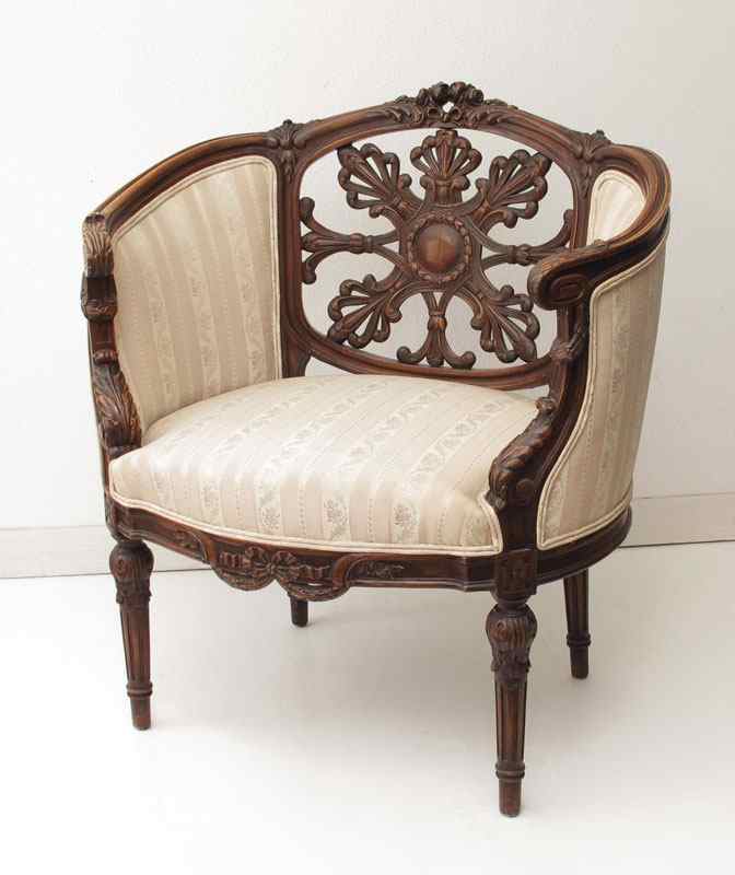 Appraisal: FRENCH CARVED BARREL BACK CHAIR Ornate carved and openwork back