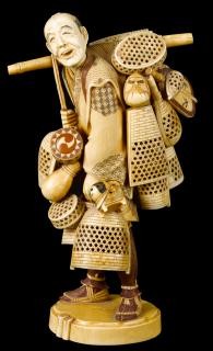 Appraisal: Japanese Meiji period carved ivory figure of a basket seller