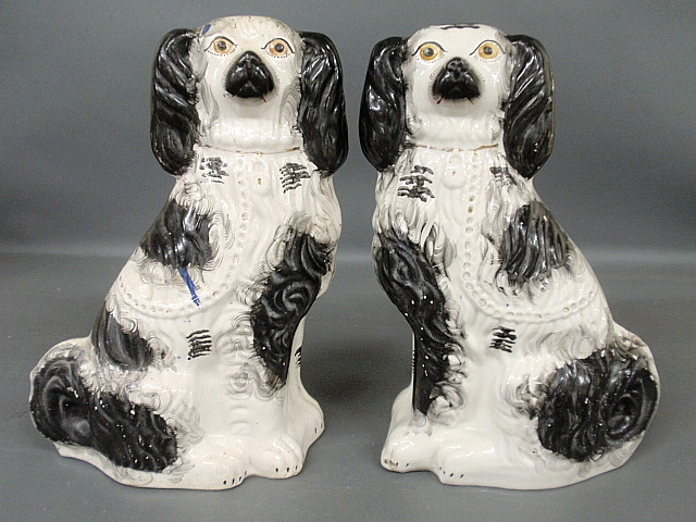 Appraisal: - Large pair of Staffordshire black and white spaniels c