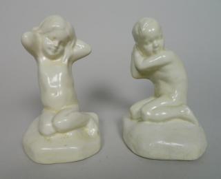 Appraisal: Cowan pottery bookends Cowan Pottery ''Boy Girl'' bookends covered with