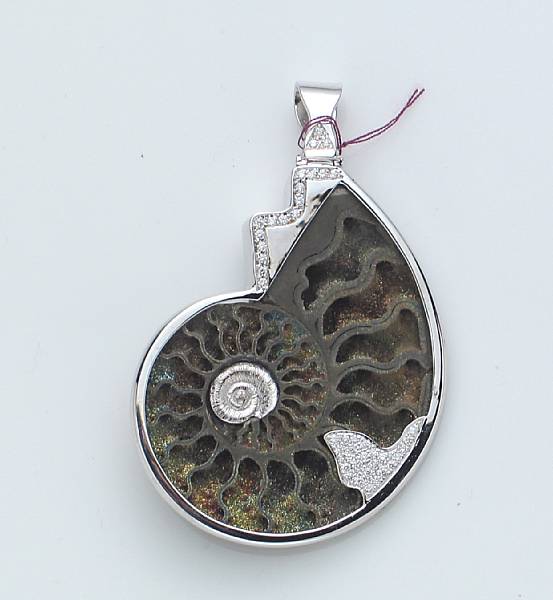 Appraisal: A diamond ammonite and k white gold pendant