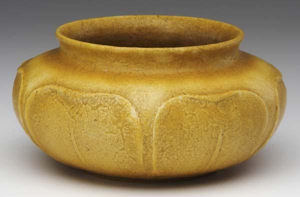 Appraisal: GRUEBY Squat vessel decorated with rounded leaves under a frothy