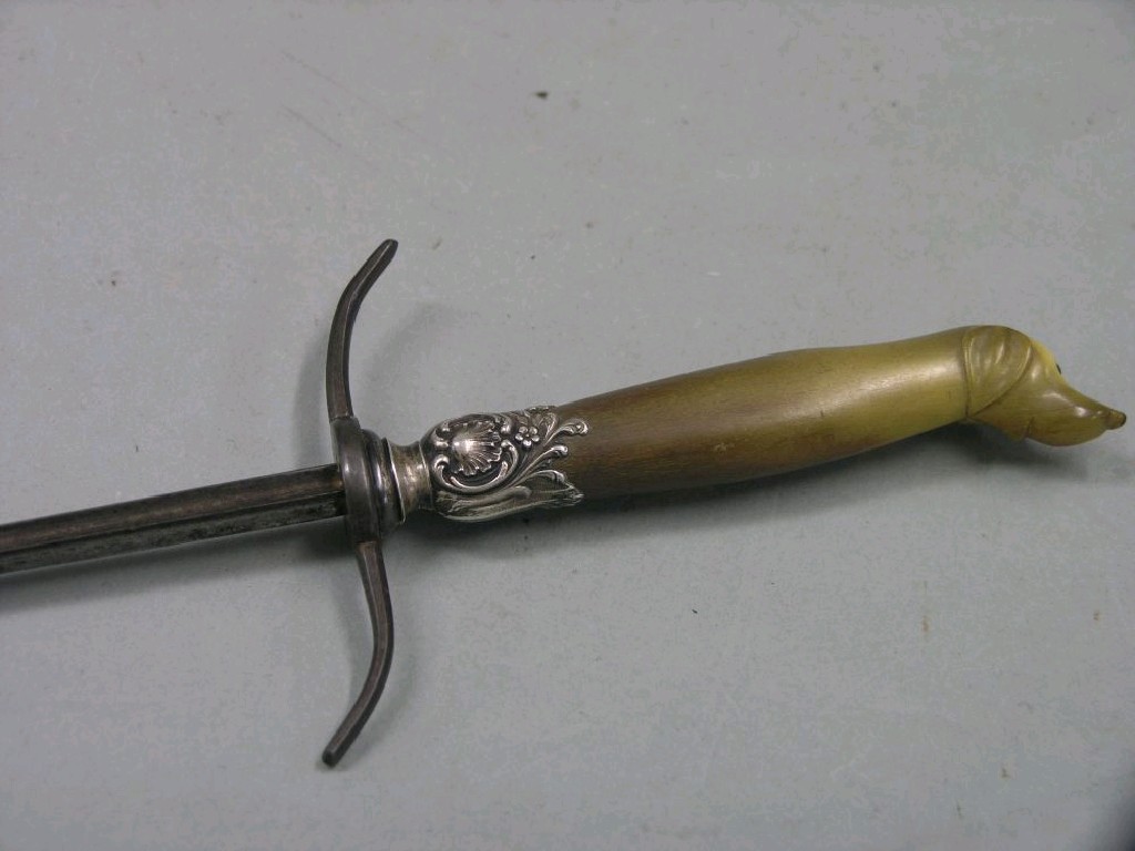 Appraisal: A th century dagger horn handle with carved dog end