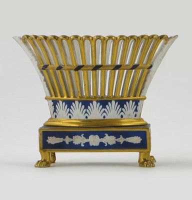 Appraisal: A continental oval pierced basket with gilt and blue leaf