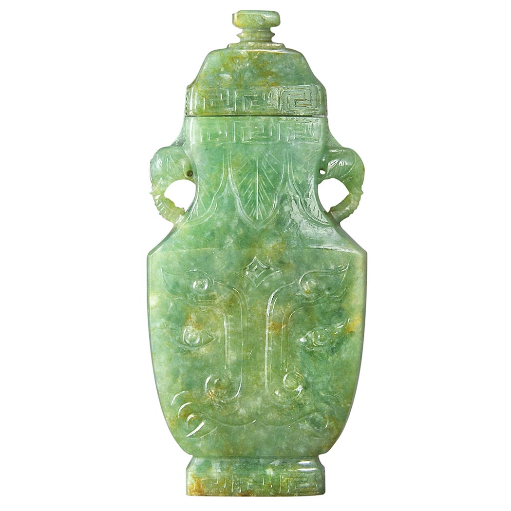 Appraisal: Chinese Jadeite Miniature Covered Vase th Century Of archaic squared