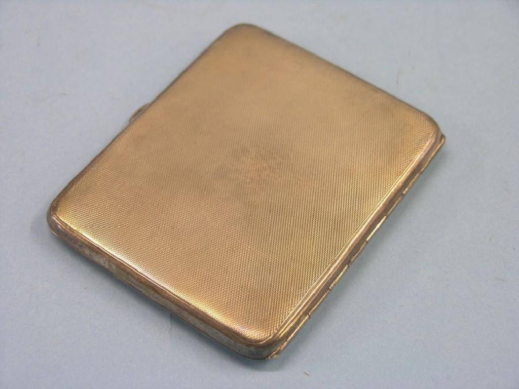 Appraisal: An engine-turned silver cigarette case Birmingham approx oz