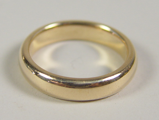 Appraisal: k Yellow Gold Wedding Band k yellow gold polished plain