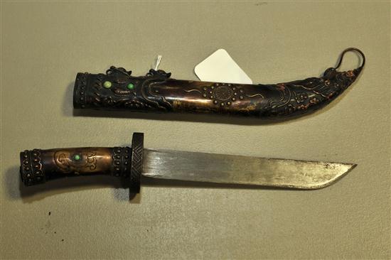 Appraisal: FANCY DAGGER IN ORNATE SHEATH Design includes dragons wheels and