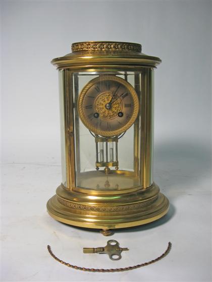 Appraisal: Louis XV style mantle gilt bronze mounted marble clockWith a