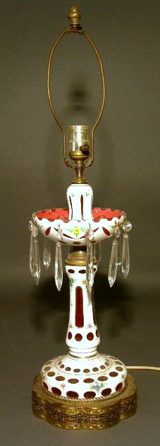 Appraisal: Glass lamp white-cut-to-ruby probably Bohemia glass with floral decoration h