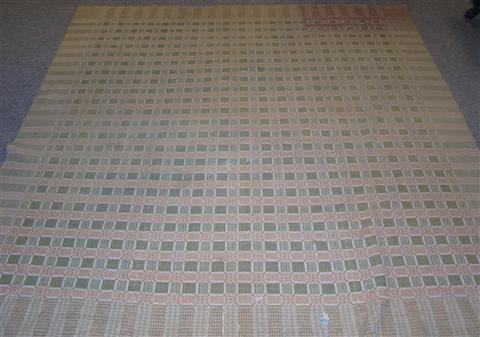 Appraisal: AMERICAN OVERSHOT COVERLET traditional pattern having cream gold and green