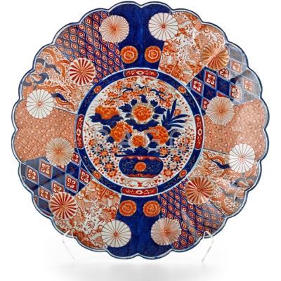 Appraisal: MONUMENTAL JAPANESE IMARI PORCELAIN CHARGER Floral basket within central medallion