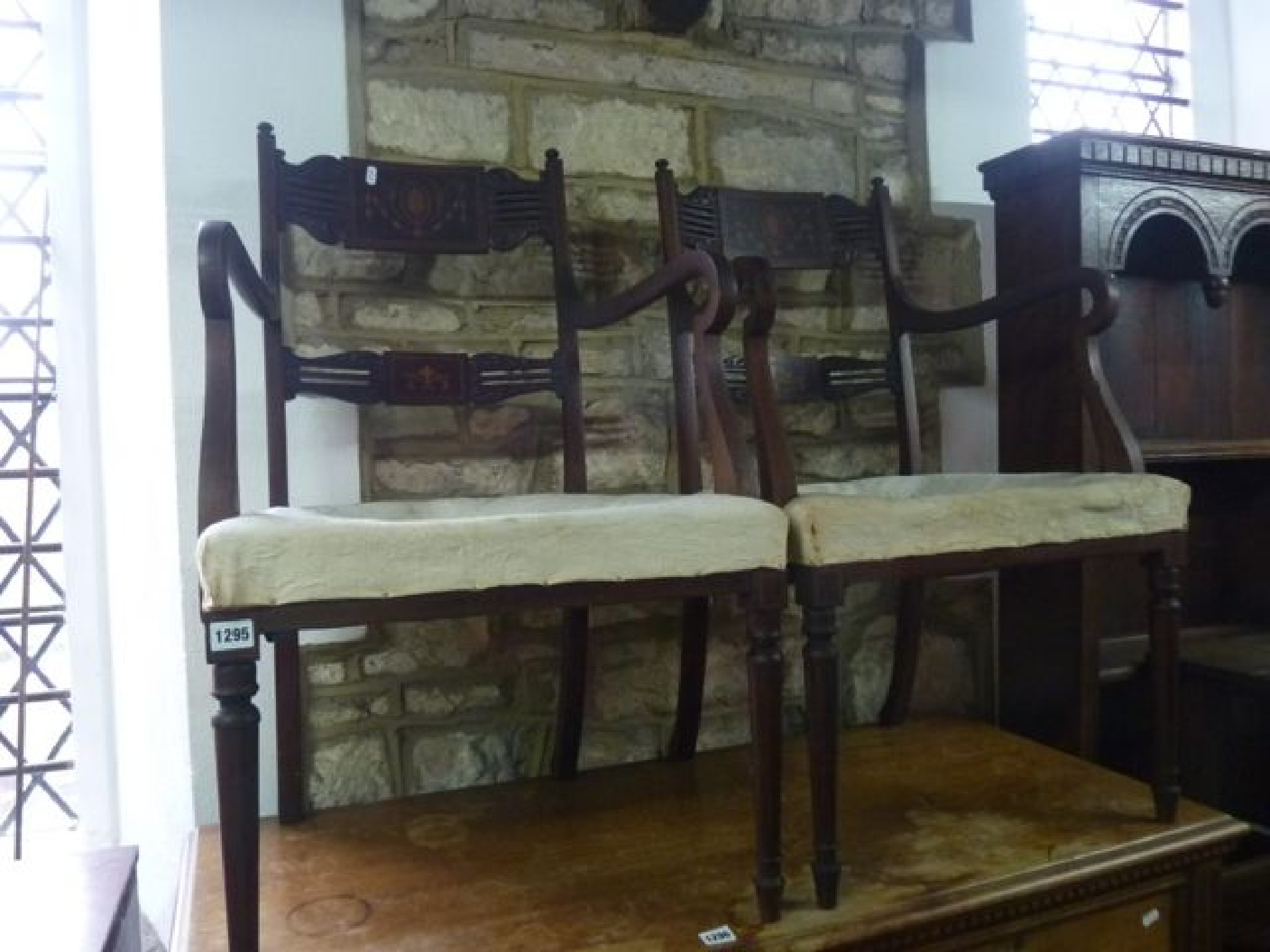 Appraisal: A set of inlaid Edwardian mahogany dining chairs the bar