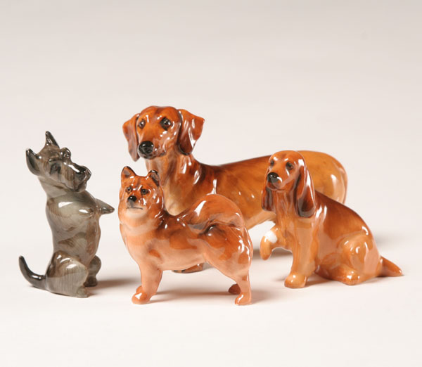 Appraisal: Royal Doulton porcelain dogs four purebreds including scottie chow daschund