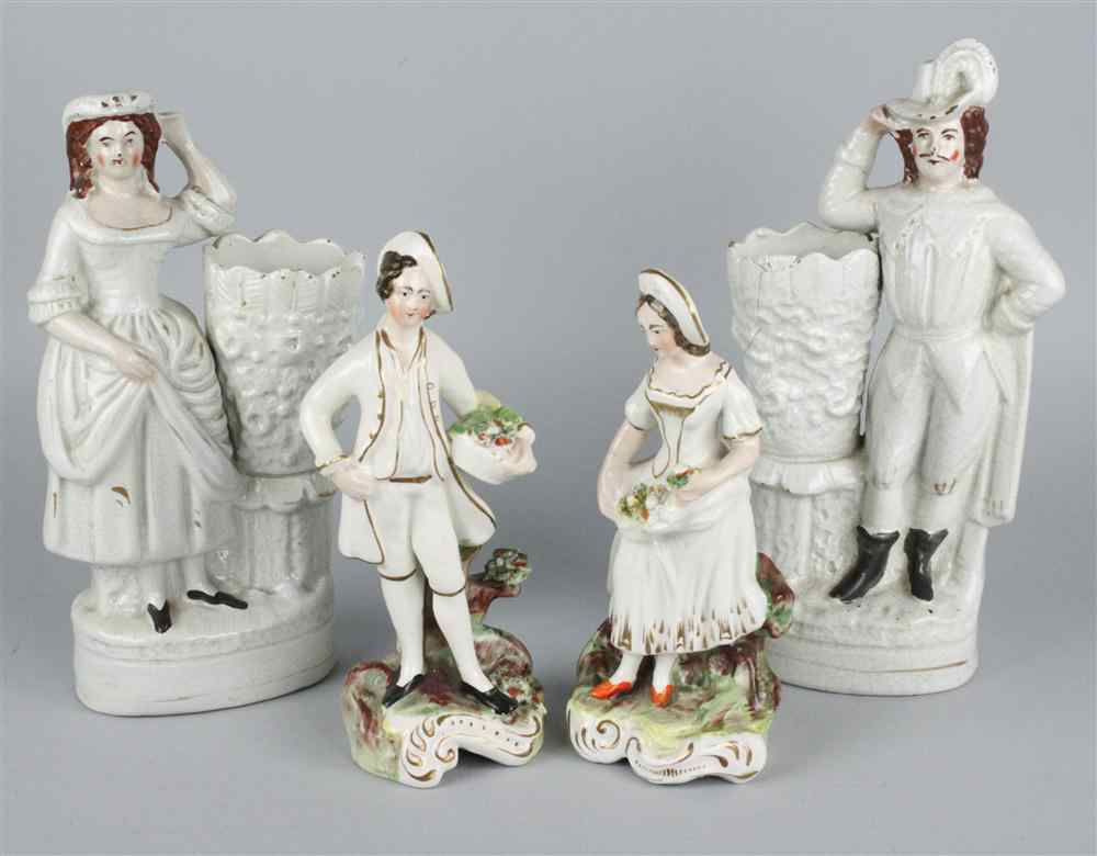 Appraisal: A PAIR OF STAFFORDSHIRE FIGURAL SPILL VASES modeled as a