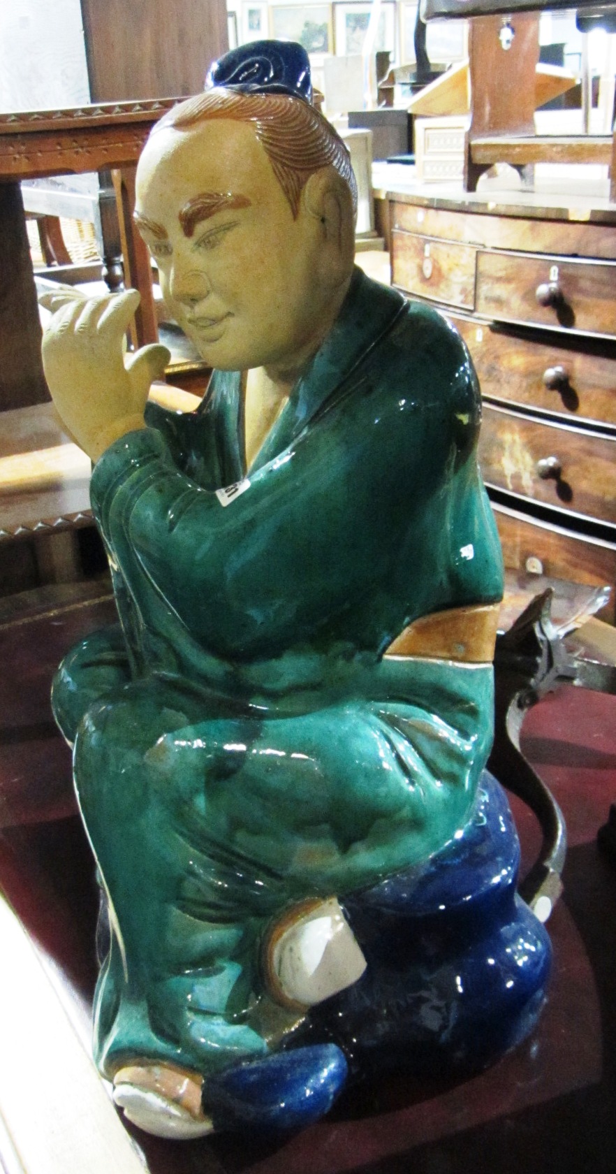 Appraisal: A large Chinese stoneware figure of a musician th century