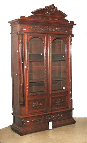 Appraisal: A Louis XVI style oak bookcase cabinet late th century