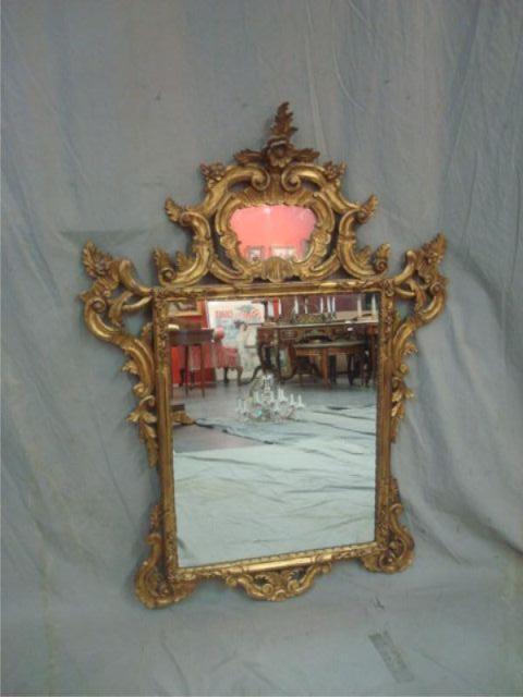 Appraisal: Italian Giltwood Rococo Style Mirror Nice gilding From a New