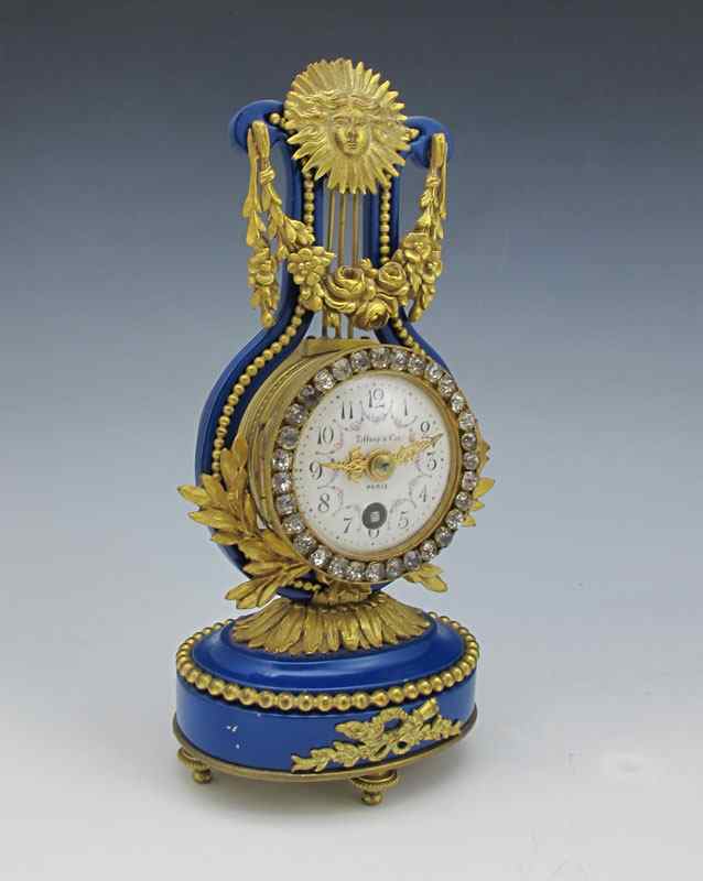 Appraisal: FRENCH TIFFANY CO LYRE CLOCK Blue cast metal frame with