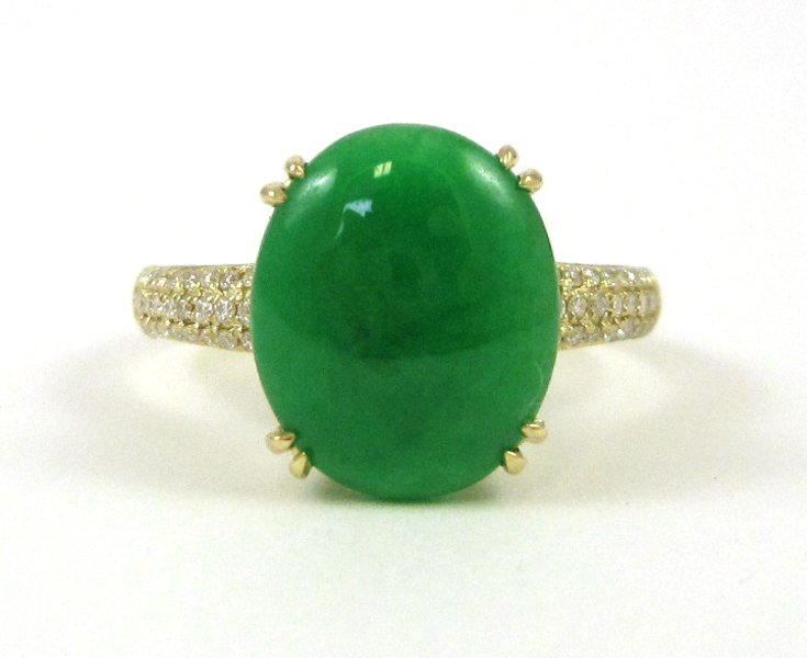 Appraisal: JADE DIAMOND AND FOURTEEN KARAT GOLD RING with three rows