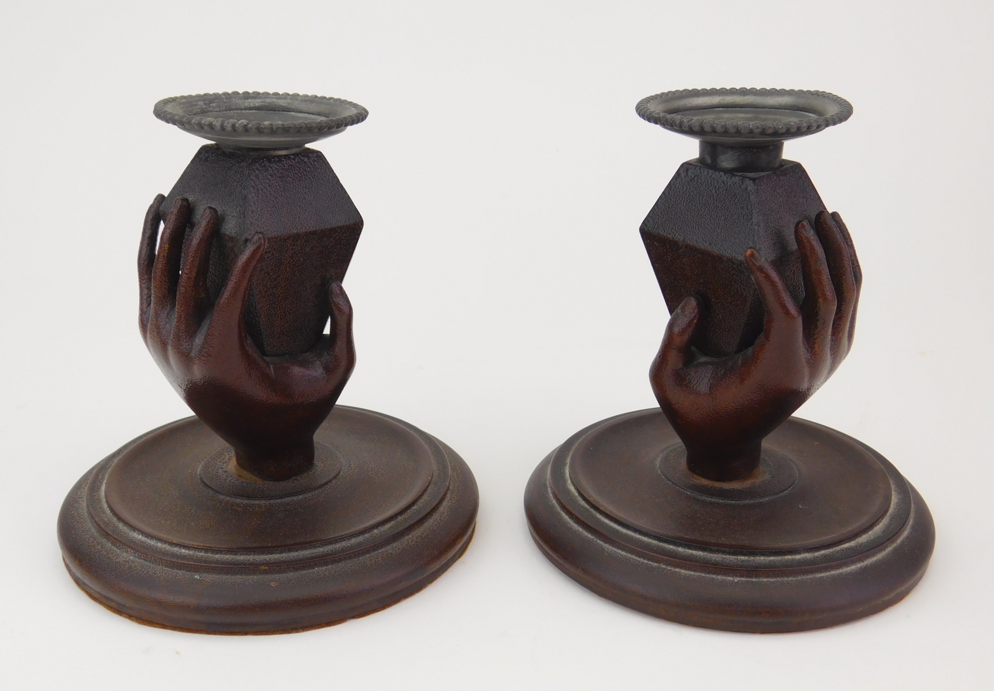 Appraisal: Pair of th c folk art carved wood candle holders