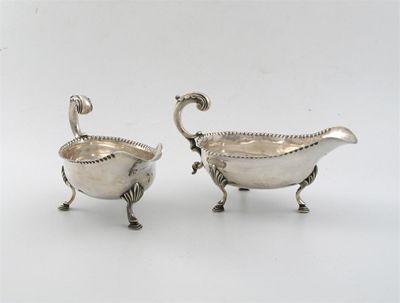 Appraisal: A pair of George III sauceboats on three feet with