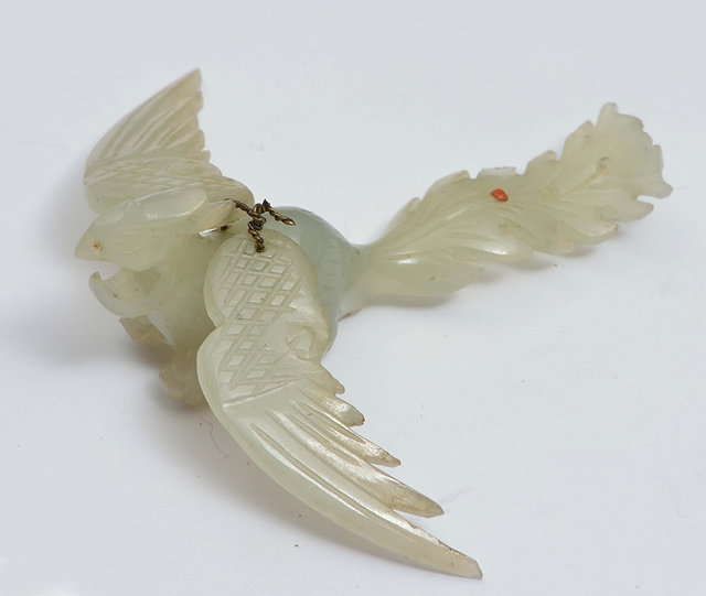 Appraisal: A CHINESE MINIATURE JADE CARVING OF A PHOENIX BIRD with