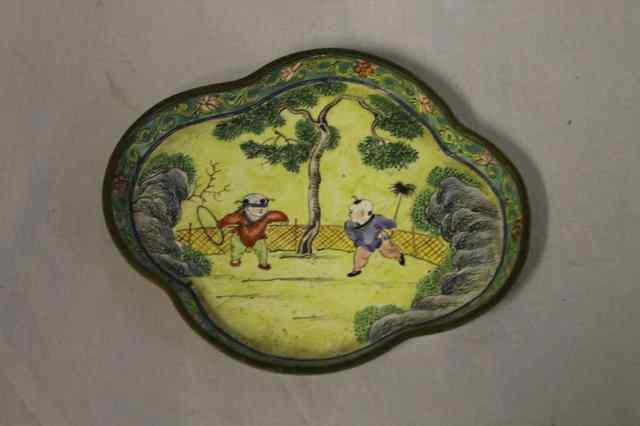 Appraisal: A CHINESE YELLOW ENAMEL SMALL DISH painted with two children