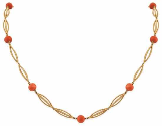 Appraisal: A CORAL NECKLACE BY MAUBOUSSIN Comprising open elongated rope twist