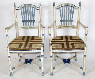 Appraisal: Pair of wheatback painted armchairs A pair of wheatback painted