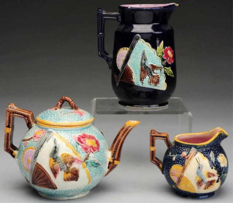 Appraisal: Lot of Majolica Pieces Includes one teapot with bird decoration