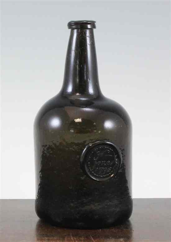 Appraisal: A black glass sealed wine bottle c of squat cylindrical