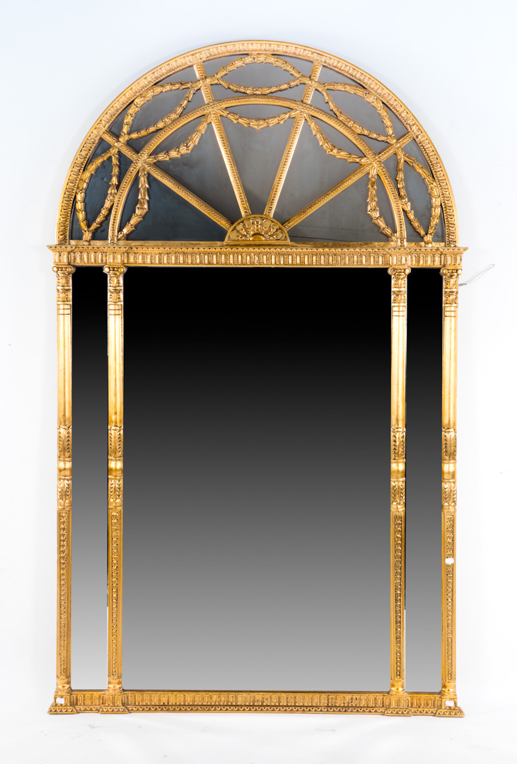 Appraisal: Classical style giltwood overmantel mirror Majestic arched top in H