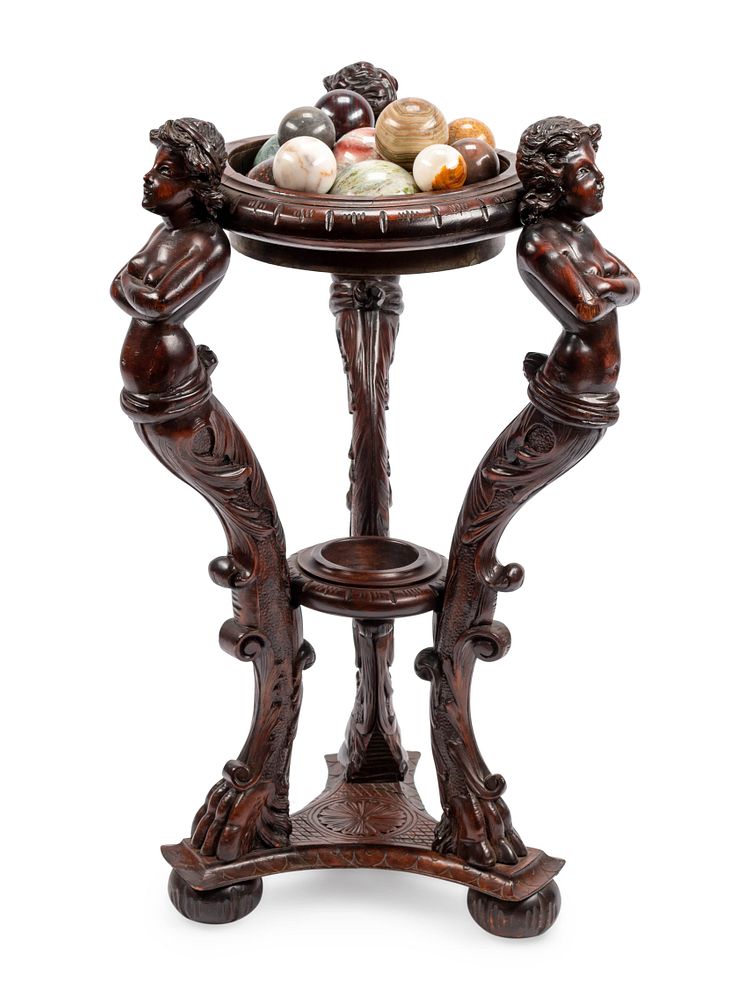 Appraisal: A Continental Carved Wood Jardiniere and Fifteen Marble Ornaments A