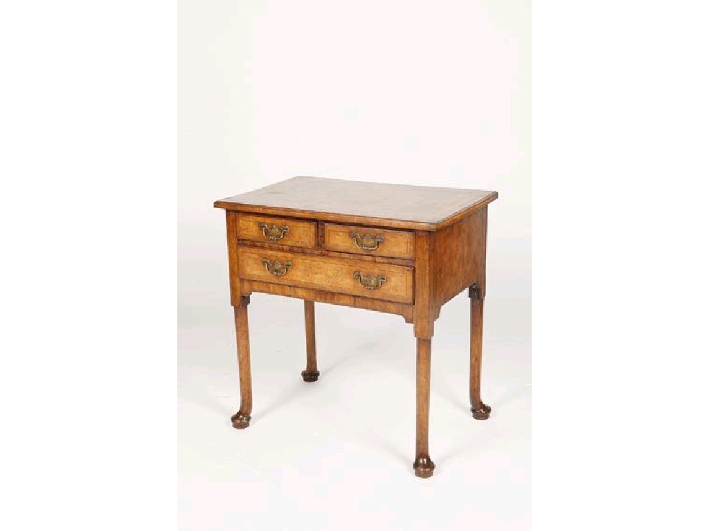 Appraisal: A GEORGE I WALNUT LOWBOY the rectangular top with quarter