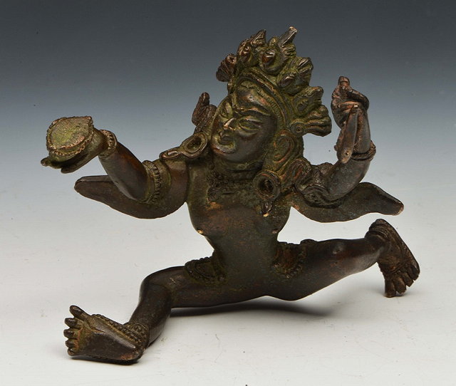 Appraisal: A TIBETAN BRONZE FIGURE of a dancing Deity cm high