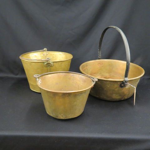 Appraisal: Antique Brass Pieces fireplace cooking pots and a bucket largest