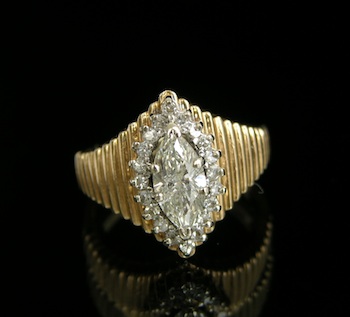 Appraisal: A Retro Marquis Cut Diamond Ring k yellow gold ring