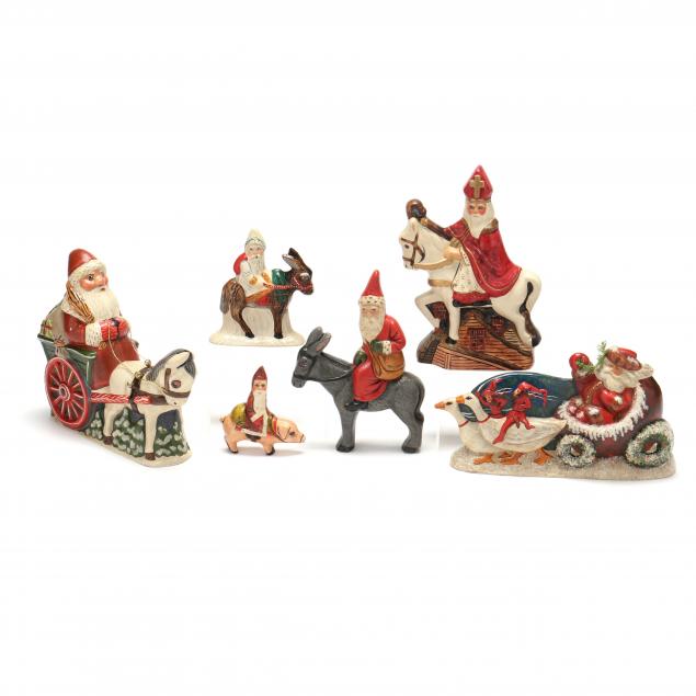 Appraisal: SELECTION OF SIX VAILLANCOURT SANTA FIGURES USING ANIMAL TRANSPORT Each