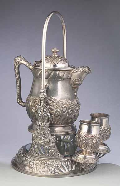 Appraisal: An American Victorian Quadruple Silverplate Ice Water Pitcher on Stand