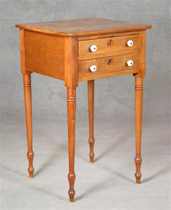 Appraisal: Walnut Two-Drawer Stand Circa Figured walnut top above two dovetailed