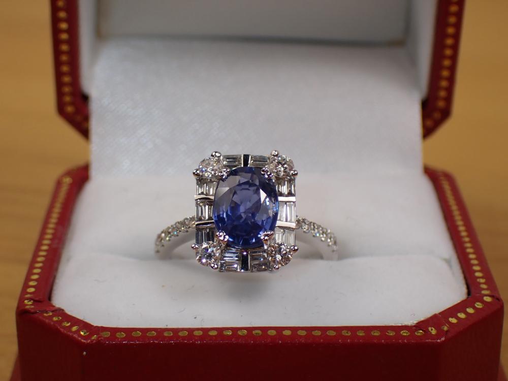 Appraisal: SAPPHIRE DIAMOND AND FOURTEEN KARAT GOLD RING The k white